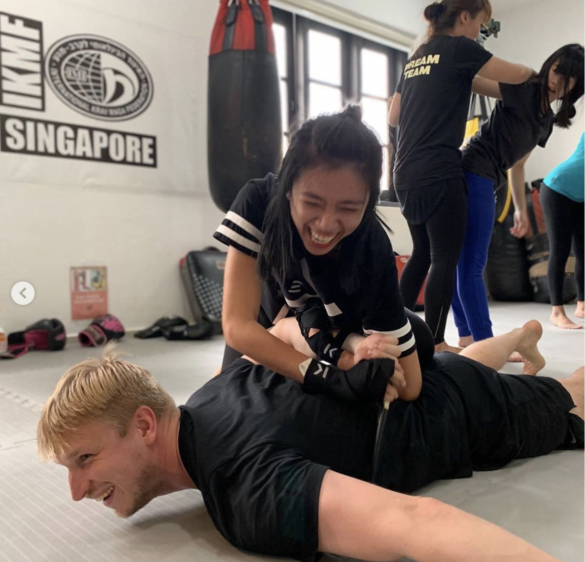 Krav Maga Instructor demonstrating how to defend against a front choke