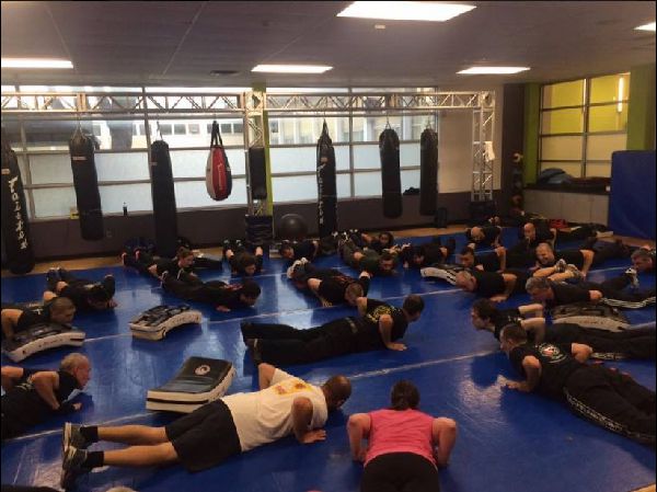 Krav Maga students doing push-ups during a Krav Maga lesson